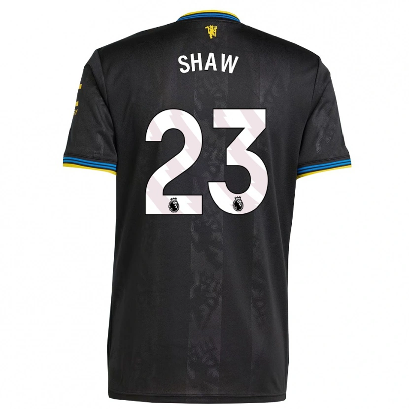 Danxen Bambino Maglia Luke Shaw #23 Nero Giallo Blu Kit Gara Third 2025/26 Maglietta